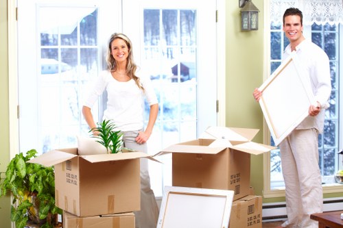 Unpacking boxes in a new Bayswater apartment
