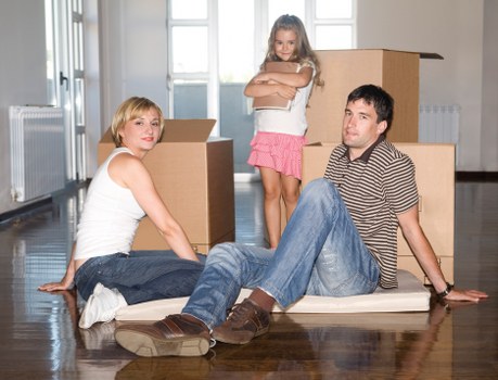 Packed boxes and furniture ready for local removals in Bayswater